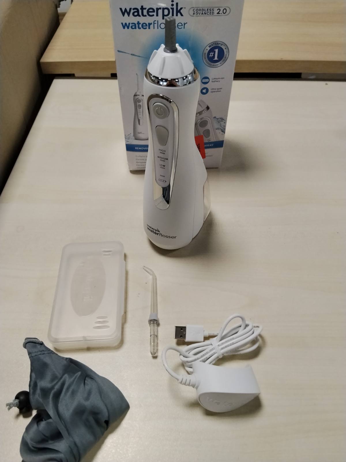 301639 - ORAL Ujitës pa Tel Waterpik Advanced, 2026, Teknologji Precize e Pulsit, 4 Gryka, 3 Mënyra, Sistem Karikimi me Induksion, i Bardhë