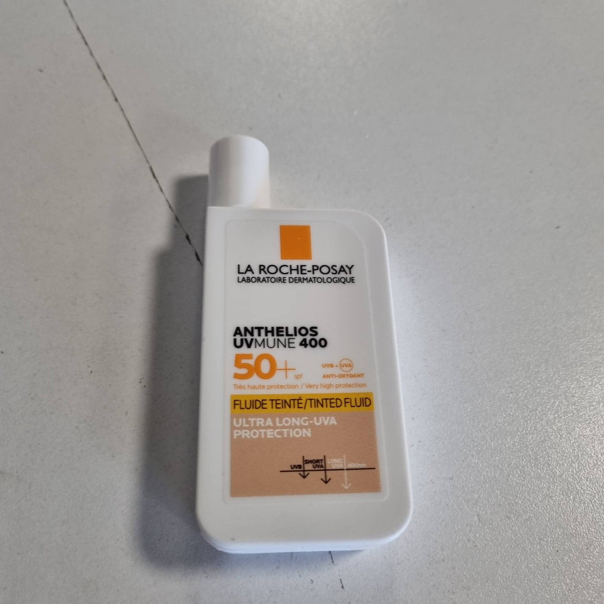 316878 - LA ROCHE-POSAY Anthelios Invisible Fluid, UVMune 400 me SPF 50+, 50 ml, Lëng mbrojtës nga dielli për lëkurë të ndjeshme