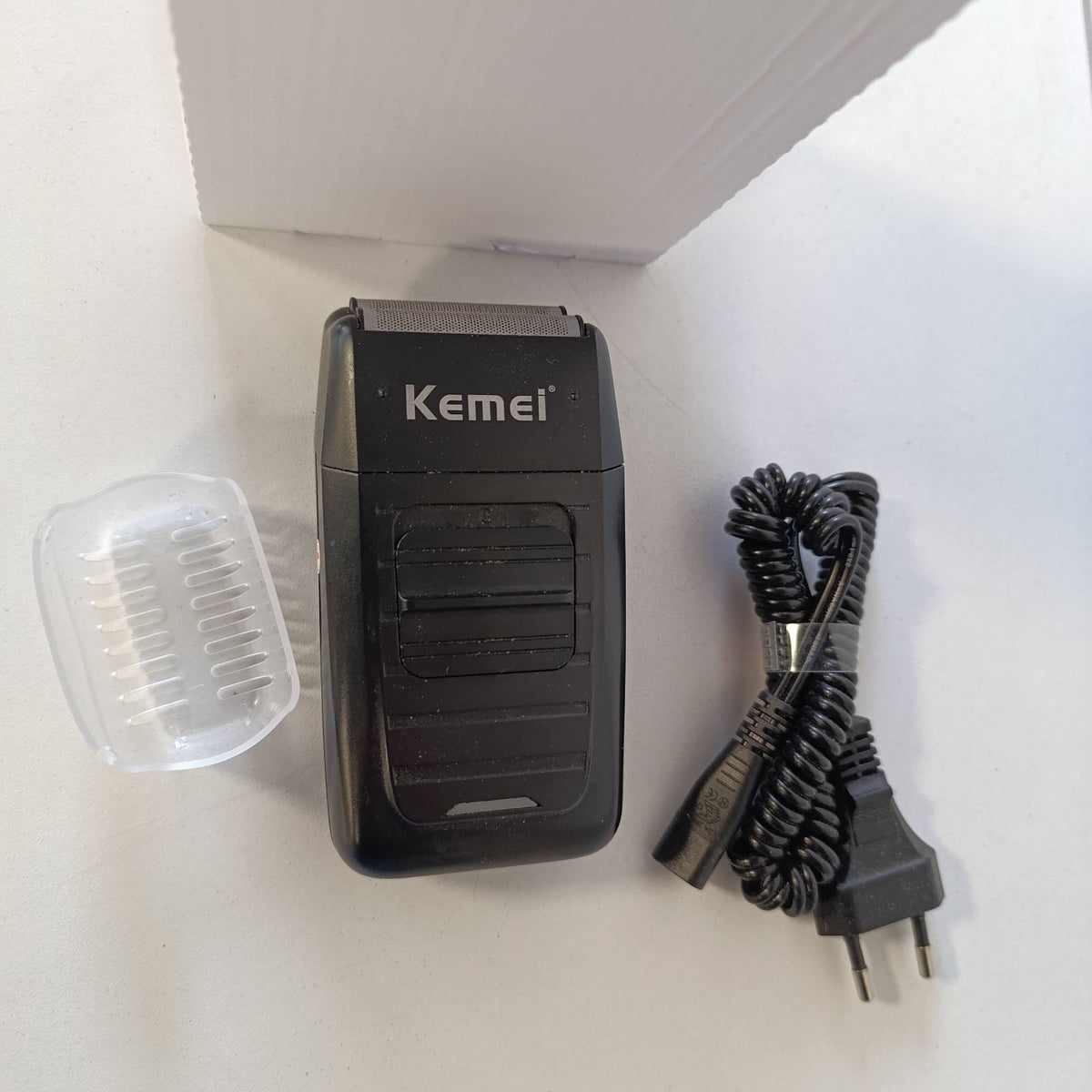 315629 - Rrojsë elektrike me bateri Kemei për meshkuj, me tehe me lëvizje vajtje-ardhje (reciproke), e rikarikueshme, për prerje precize të mjekrës dhe favorshëmve (mënjanëseve), me dy tehe, multifunksionale për kujdesin personal.