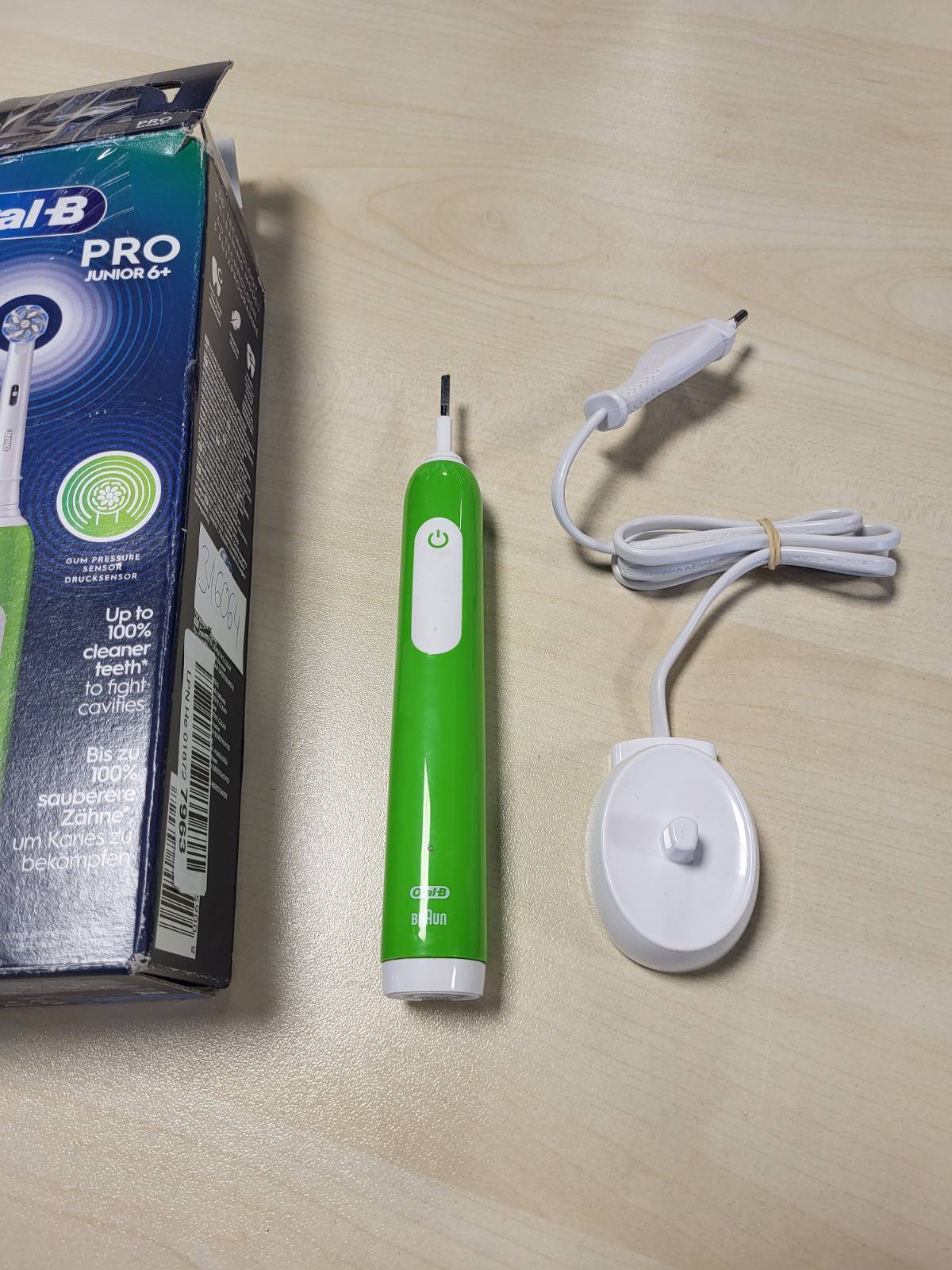 316064 - ORAL-B - Furçë dhëmbësh elektrike Pro Junior për fëmijë, 1 karikues, 1 kokë furçe e rrumbullakët, jeshile