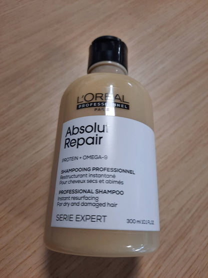 303427 - L'OREAL PROFESSIONNEL - Shampo ristrukturuese e menjëhershme Absolut Repair - 300 ml - Flokë të thatë dhe të dëmtuar - 77% më pak dëme - 7 herë më shumë shkëlqim