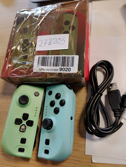 273205 - KONIX Palë Joypad-esh për Nintendo Switch dhe Switch OLED - I pajtueshëm me Nintendo Switch 2 - Jetëgjatësi baterie 8 orë - Funksion dridhjeje - Jeshile dhe Blu
