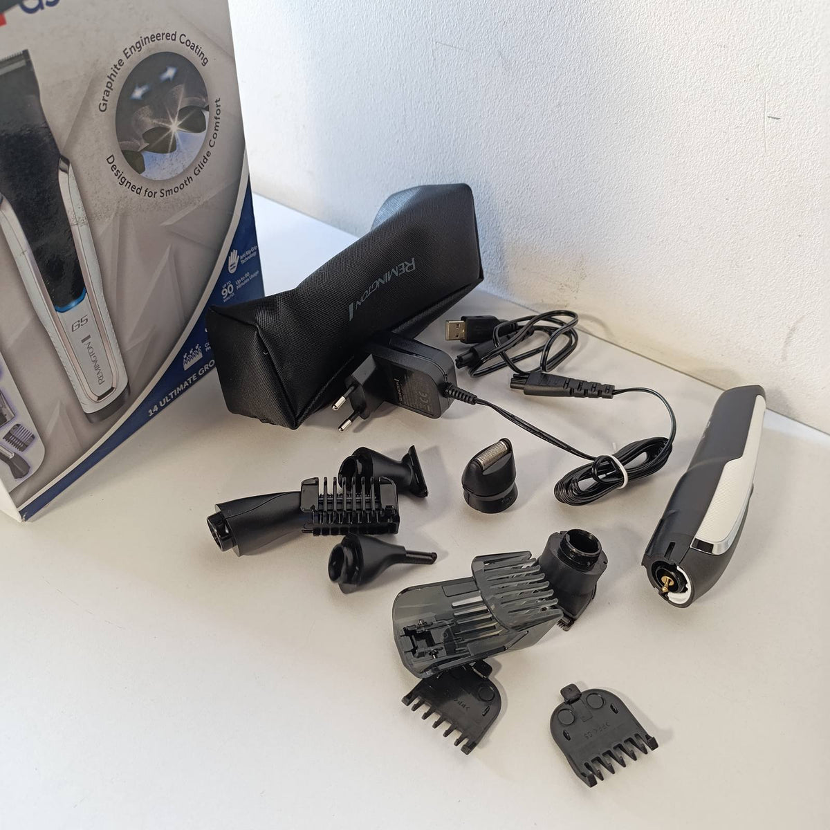 315817 - REMINGTON Makinë prerëse flokësh dhe prerëse mjekre Lithium G5, përfshin 9 koka/krehëra bashkangjitës, model PG5000