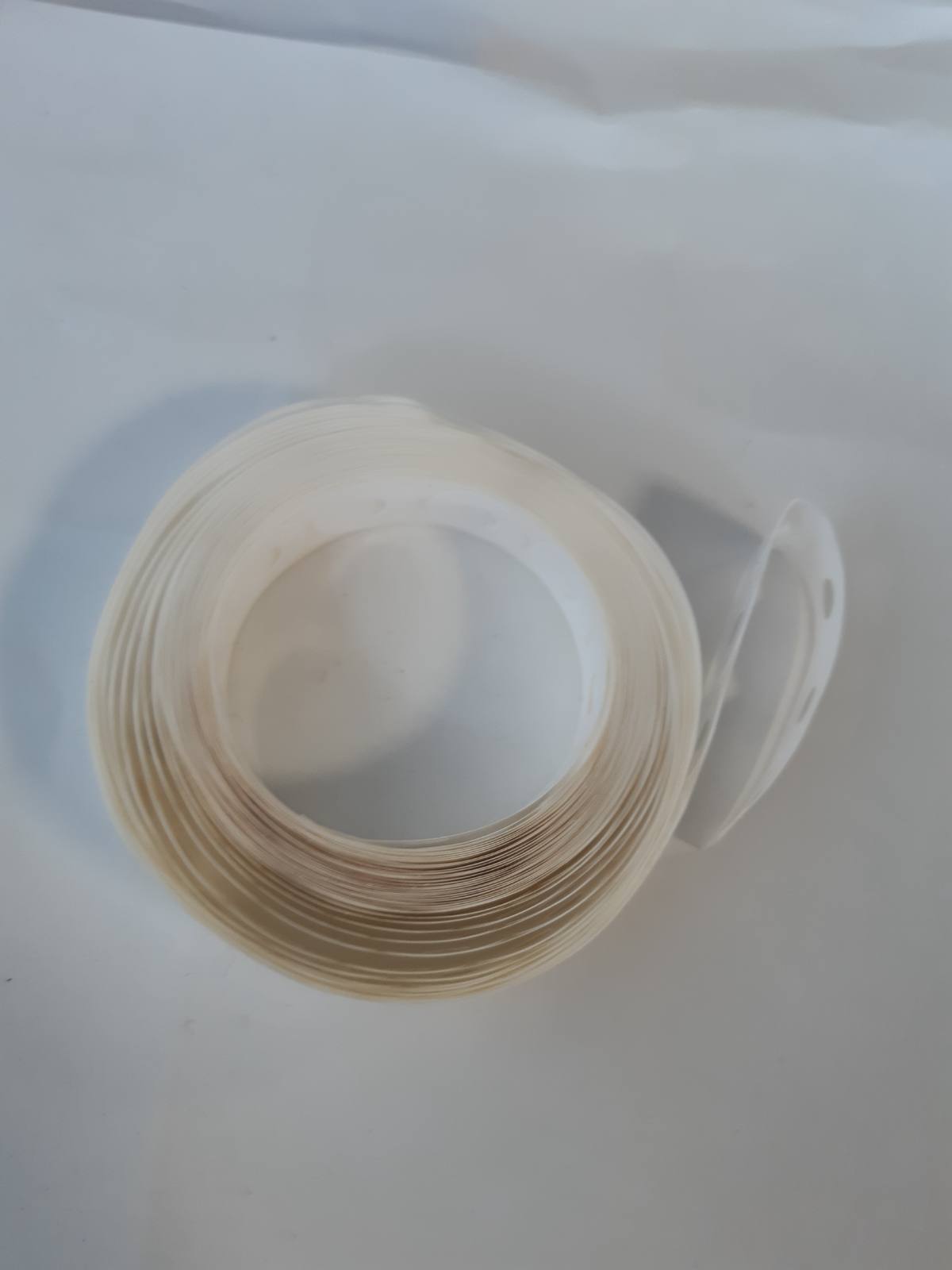 274785 - HERMA 5899 Unaza përforcuese në rul, 500 copë, Ø 12 mm, vetëngjitëse, përforcuese vrimash rezistente ndaj grisjes, mat, bosh, transparente