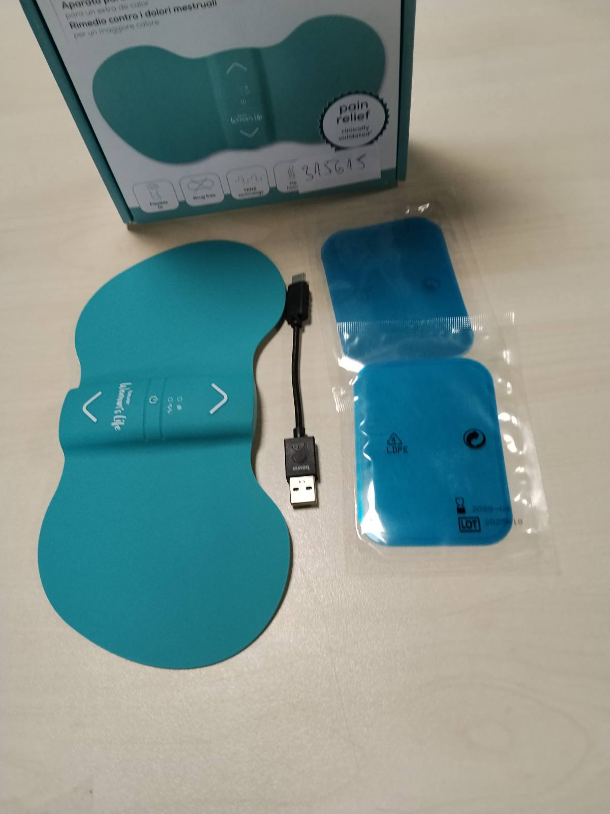 315615 - BEURER EM 55 Menstrual Relax+, për lehtësimin e dhimbjeve menstruale, funksion TENS dhe ngrohjeje, bateri e rikarikueshme, sipërfaqe ngrohëse e madhe, ngjyrë bruz