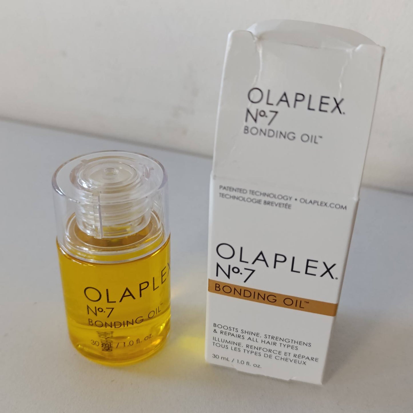 316484 - OLAPLEX Vaj për flokë Nr. 7, 30 ml, Vaj i koncentruar me shkëlqim të lartë, Mbrojtje nga nxehtësia, Zbut flokët, Kontroll i kaçurrela deri në 72 orë