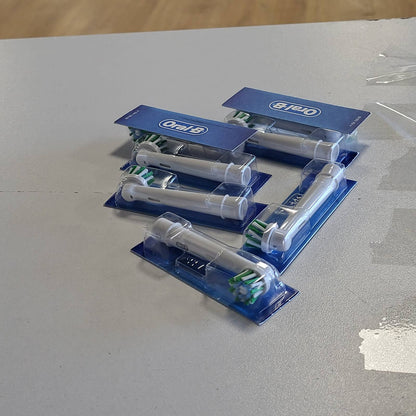 316135 - ORAL-B Koka Furçash Zëvendësuese Cross Action, Pako me 8, të Bardha, Filamente për Heqjen e Pllakës