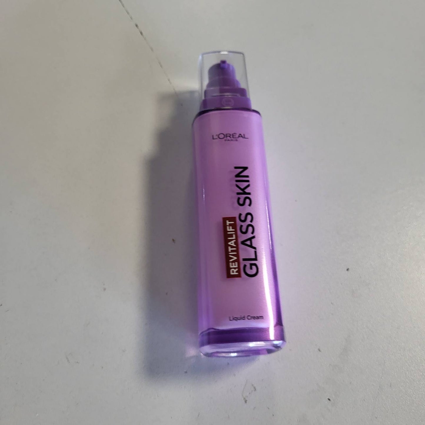 317060 - L'ORÉAL PARIS Kujdes për fytyrën Smoothing Radiance Krem i lëngshëm hidratues 70 ml, me acid hialuronik dhe vitamina B5 dhe Cg + B3, për të gjitha llojet e lëkurës