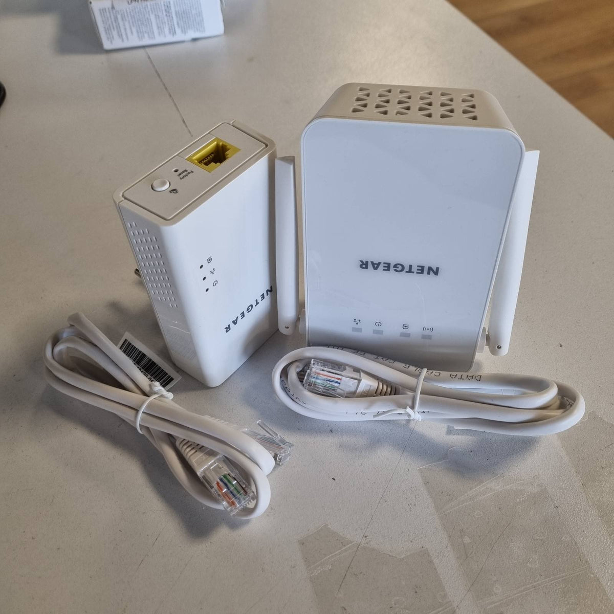 299030 - NETGEAR Adaptues Plw1000-100Pes Powerline AV1000, Kondicioner pa tel me dy banda, 2 porta Gigabit