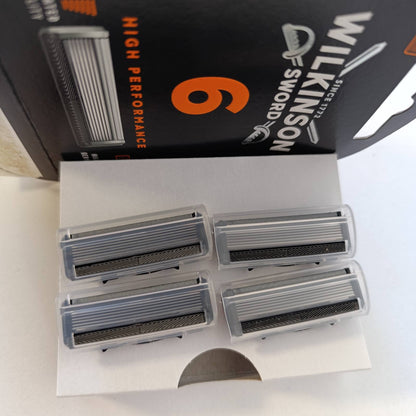 303549 - WILKINSON SWORD Brisk për meshkuj me 6 tehe të veshura me diamant, 4 tehe zëvendësuese