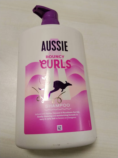 298493 - AUSSIE Shampo Bouncy Curls, 1000 ml, Pastron dhe Hidraton Flokët Kaçurrela, Pa Silikon, Vegan