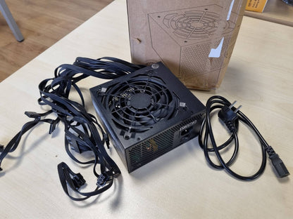 295160 - TACENS Anima APIII750, Furnizim me energji PC ATX 750W, teknologji SMD dhe DC-DC, efikasitet 85% 12V, ventilator ultra i qetë 12cm, kabllo të sheshta ekstra të gjata, të zeza