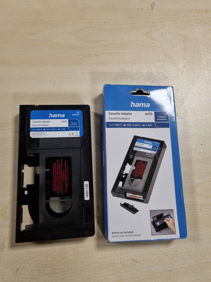 299504 - PËRSHTATËS KASETE HAMA VHS-C/VHS, 6 MM, JO I PAJTUESHËM ME 8 MM/MINIDV/HI8, I ZI