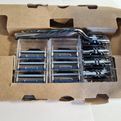 303155 - GILLETTE Brisku për Burra Mach3, dorezë çeliku inox, 12 fishekë mbushës me 3 tehe, shirit lubrifikues.