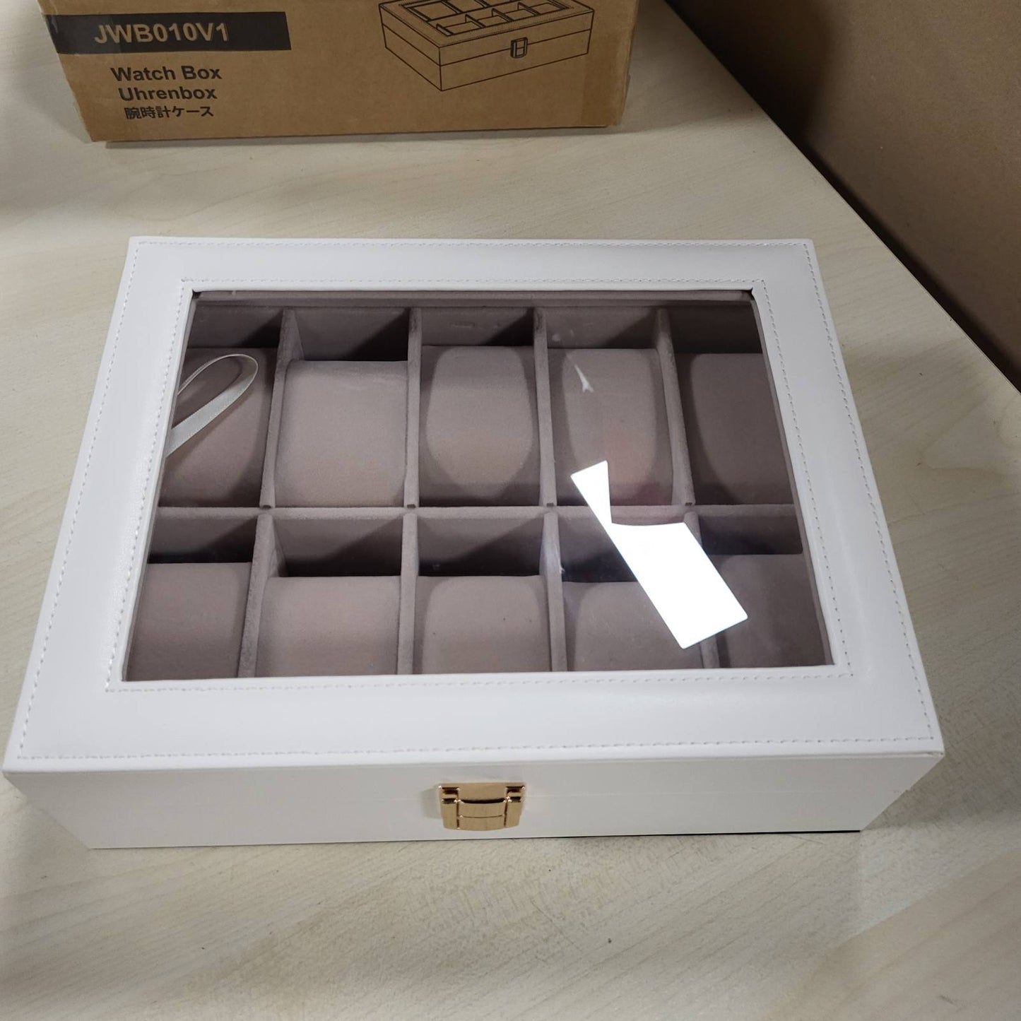 294142 - SONGMICS Kuti ore me 10 vende, Kuti bizhuterish, Kapak qelqi, Jastëkë të lëvizshëm, Kyç metalik, Pjesa e jashtme ngjyrë e bardhë reje dhe Rreshtim bezhë kapuçino JWB010W01