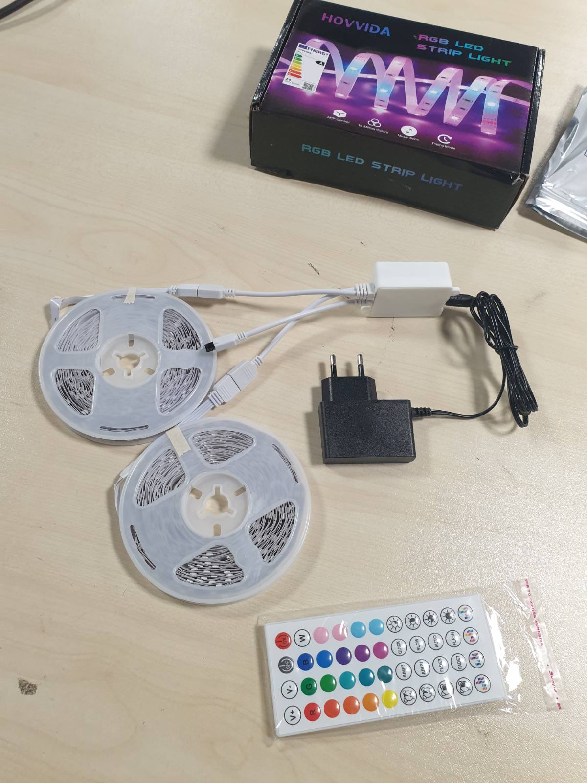 185460 - HOVVIDA Shirit LED 20M, 30 LED/Metër, Seti i 2 (2x10m), Voltazh RGB 24V, 600 LED, i kontrollueshëm me APLIKACION dhe Telekomandë, Sync Muzikor, Modalitet Kohëmatësi, Përdorim për Dhomë Gjumi, Dhomë Lojërash, Festë, Festival