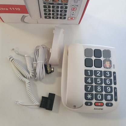 299530 - SWISSVOICE Xtra 1110 - Telefon fiks me kabllo - Butona të mëdhenj - 6 butona thirrjeje të shpejtë me foto - Zile shumë të larta - Dritë treguese - Përforcim audio - I pajtueshëm me aparat dëgjimi - I bardhë