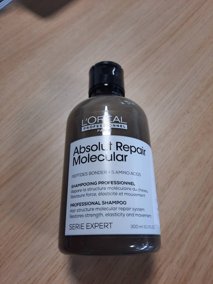 317160 - L'ORÉAL PROFESSIONAL Shampo Profesionale pa Sulfate, Absolut Repair Molecular, 300 ml, riparon dëmtimet, pastron dhe forcon flokët, ofron elasticitet për flokë të thatë dhe të dëmtuar.