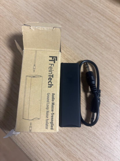 320464 - FEINTECH Ndarës tokëzimi audio ATG00101, filtër rryme manteli, prizë jack 3.5 mm, eliminon zhurmën