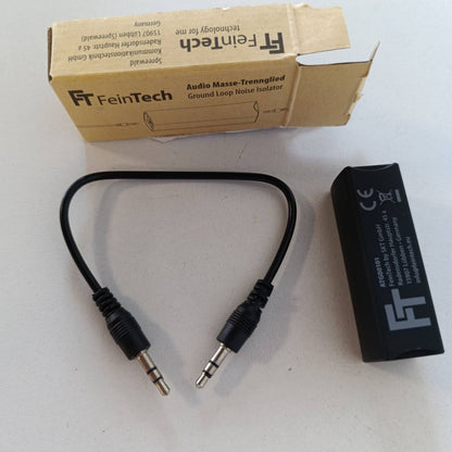 320465 - FEINTECH Ndarës tokëzimi audio ATG00101, filtër rryme manteli, prizë jack 3.5 mm, eliminon zhurmën