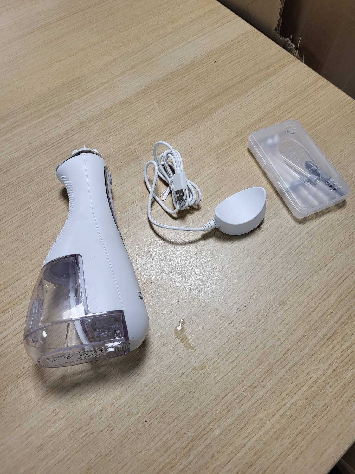 315290 - Advanced Pastrues Dentar pa Tel, Sfungjer Uji Portativ i Rikarikueshëm me Kabllo USB, heq Pllakën, 3 Nivele Presioni, E Bardhë (WP-580EU)