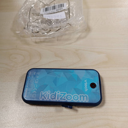 292315 - VTECH KidiZoom Snap Touch Blue, Kamera Dixhitale Portative, Foto, Selfie, Video, Ekran me Prekje me Ngjyra, MP3 Player, Bluetooth, për fëmijë 6-13 vjeç - Përmbajtje në Frëngjisht