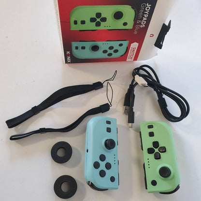 299454 - KONIX Palë Joypad-esh për Nintendo Switch dhe Switch OLED - I pajtueshëm me Nintendo Switch 2 - Jetëgjatësi baterie 8 orë - Funksion dridhjeje - Jeshile dhe Blu