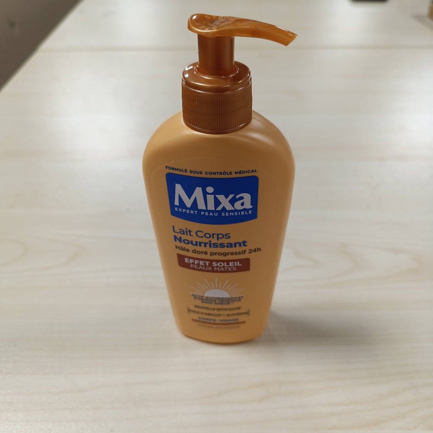 318885 - MIXA - Locion ushqyes për trupin me efekt dielli, vetë-nxirje graduale 24 orë, 250ml, gjalpë Shea dhe vaj kajsie, trup dhe fytyrë, lëkurë e errët