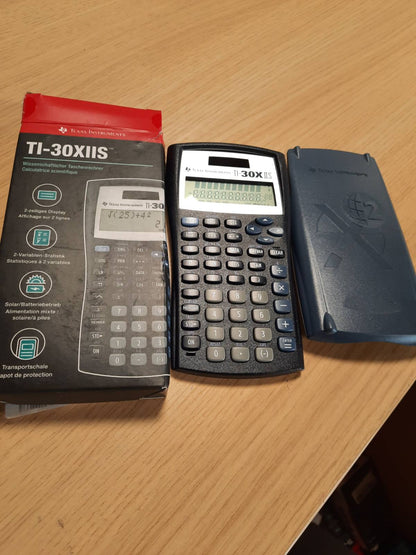 276661 - TEXAS INSTRUMENTS Kalkulator Shkollor TI-30 XIIS (me dy rreshta, me energji diellore dhe me bateri) Blu e errët