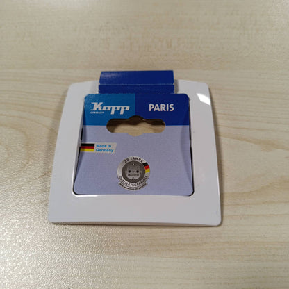 294107 - KOPP Kornizë PARIS, 83 x 83 x 9.5 mm, mbulesë e bardhë arktike, për priza dhe çelësa, plastike elegante, cilësi e lartë