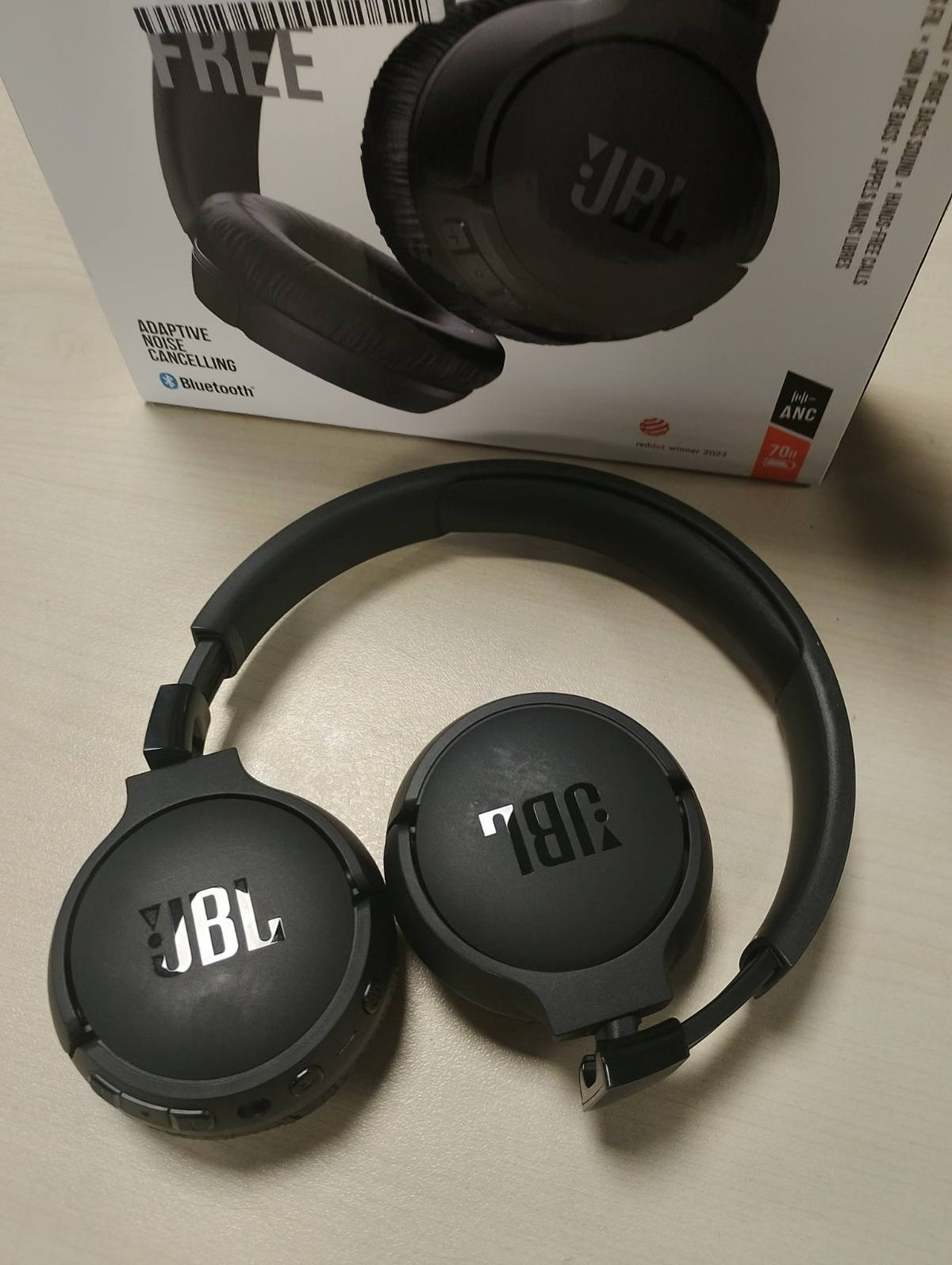 276132 - JBL Kufje pa tel Tune 670NC për vesh, Jetëgjatësi baterie deri në 70 orë, Anulim adaptues i zhurmës, Ambient inteligjent, E zezë