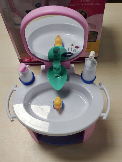 293037 - Baby Born Lavaman për duar, Tavolinë për larjen e kukullave për kukulla 36cm dhe 43cm, përfshirë furçën e dhëmbëve dhe dozatorin e sapunit, funksionon me ujë, pa bateri