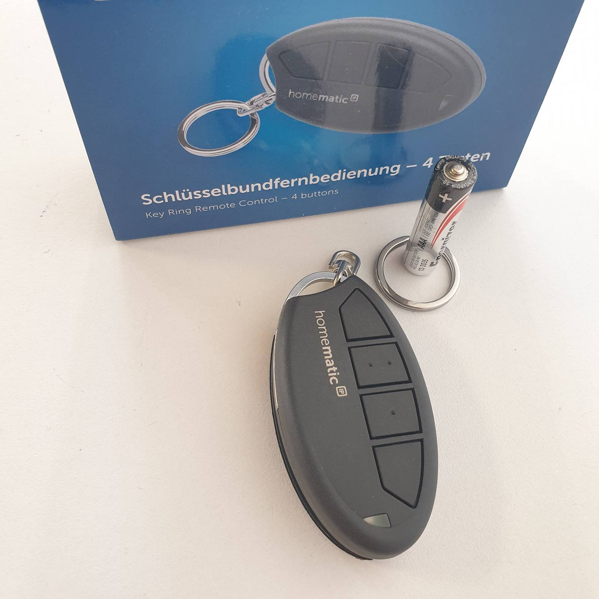 313056 - HOMEMATIC Telekomandë me varëse çelësash IP, 4 butona