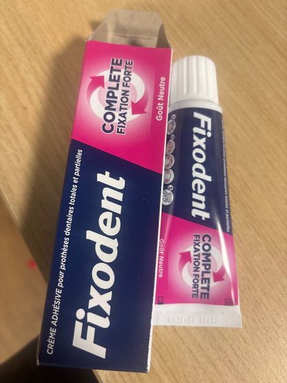 319033 - FIXODENT Krem ngjitës me aromë neutrale për proteza totale dhe të pjesshme, 47ml