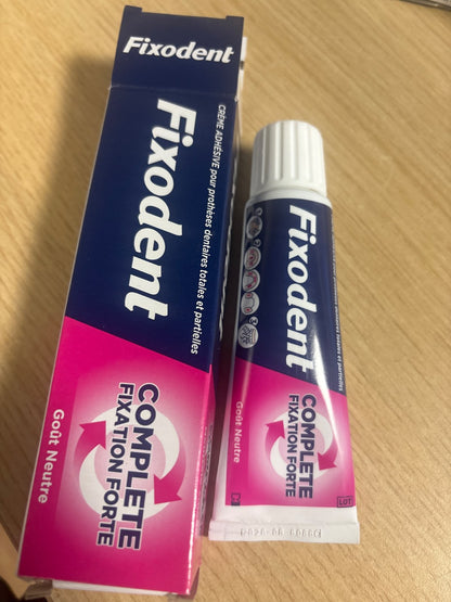 319034 - FIXODENT Krem ngjitës me aromë neutrale për proteza totale dhe të pjesshme, 47ml