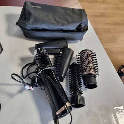 301695 - BABYLISS Furçë rrotulluese për tharëse flokësh AS200E, me 4 aksesorë të ndërrueshëm, funksion jonik, ngjyra e zezë
