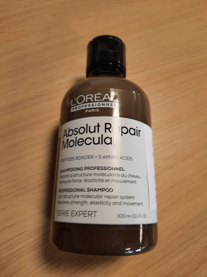 317077 - L'ORÉAL PROFESSIONNEL Shampo Profesionale pa Sulfate, Absolut Repair Molecular, 300 ml - Riparon Dëmtimet, Pastron dhe Forcon Flokët, Ofron Elasticitet për Flokë të Thatë dhe të Dëmtuar