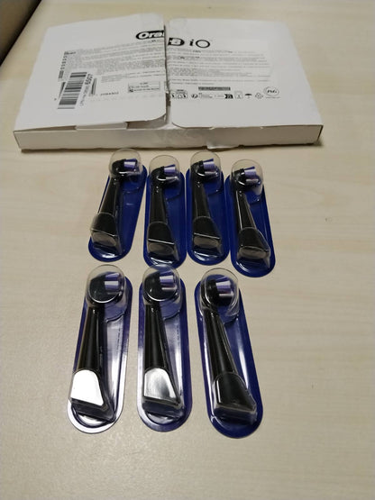 302785 - ORAL-B Koka furçe të rrumbullakëta zëvendësuese iO Series Radiant, 8 copë, Qime të pjerrëta për heqje më të mirë të pllakës