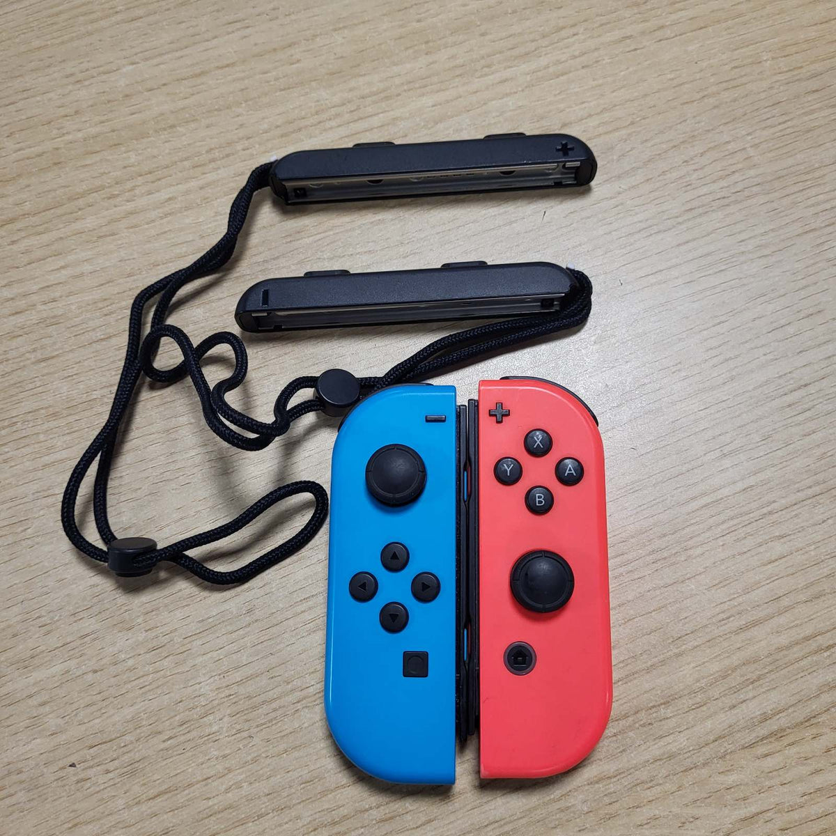 308708 - NINTENDO Switch - Kontrollues Joy-Con Neon-Rot / Neon-Blau (Set 2er)