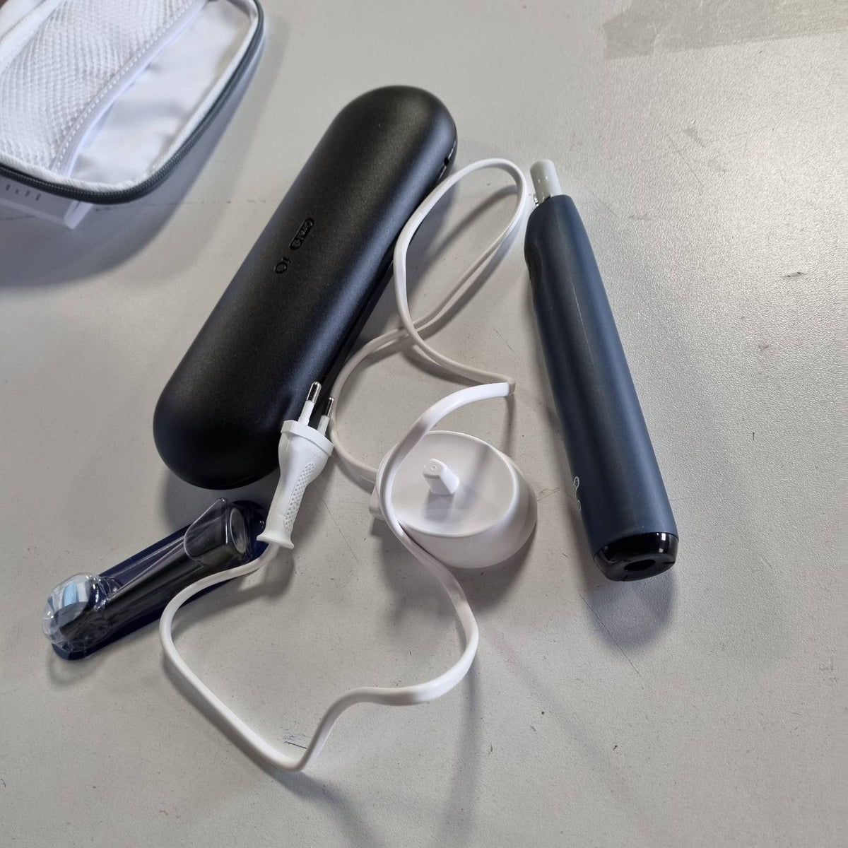 302803 - ORAL-B Furçë dhëmbësh elektrike iO Series 2, 1 kokë furçe, 3 mënyra larjeje, teknologji magnetike, kuti udhëtimi, e projektuar nga Braun, Ocean Blue