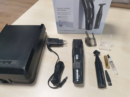 289526 - BABYLISS Makinë prerëse flokësh Carbon Titanium pa tel, 26 gjatësi prerjeje (0.5 mm-25 mm), ngjyrë argjend/e zezë, përfshin mini prerëse E978E.