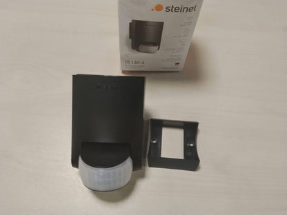 288647 - STEINEL Detektor lëvizjeje i zi IS 130-2, për ambiente të jashtme/të brendshme, sensor infra të kuqe 130°, rreze maksimale 12 m, IP54