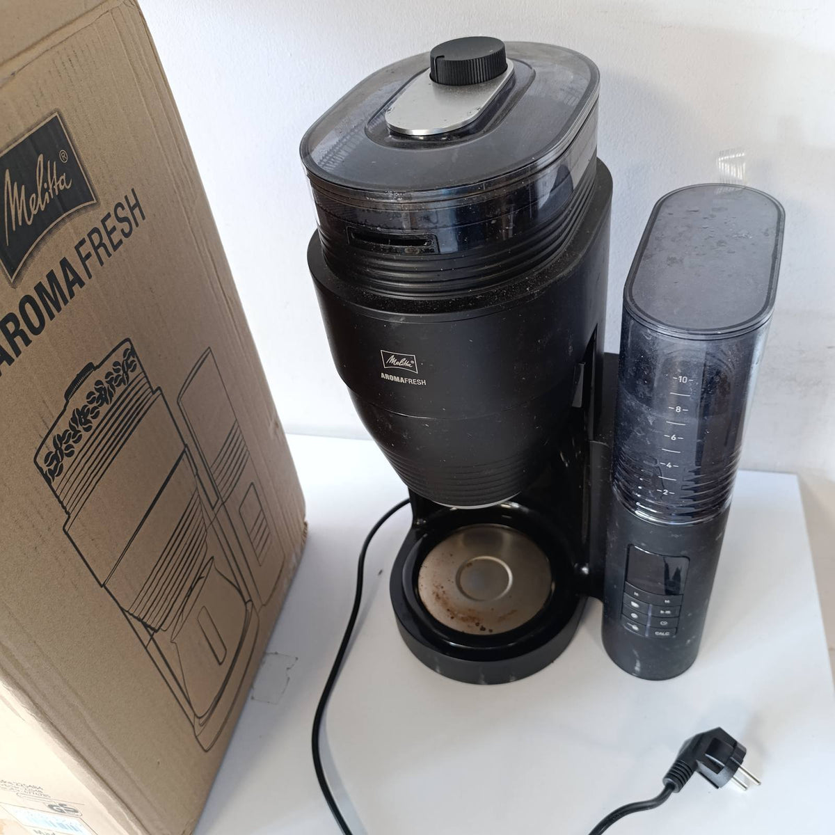320780 - MELITTA Makinë kafeje AromaFresh X me mulli, filtër me karafe qelqi, për deri në 10 filxhanë kafe, e zezë/argjendtë