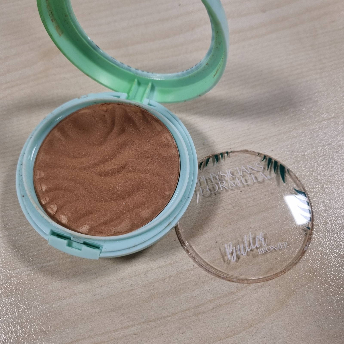 303430 - PHYSICIANS FORMULA - Bronzues me Gjalpë Murumuru - Bronzues për Fytyrën Illumite - Përfshirë Pasqyrë dhe Aplikues - Hije të Thellë