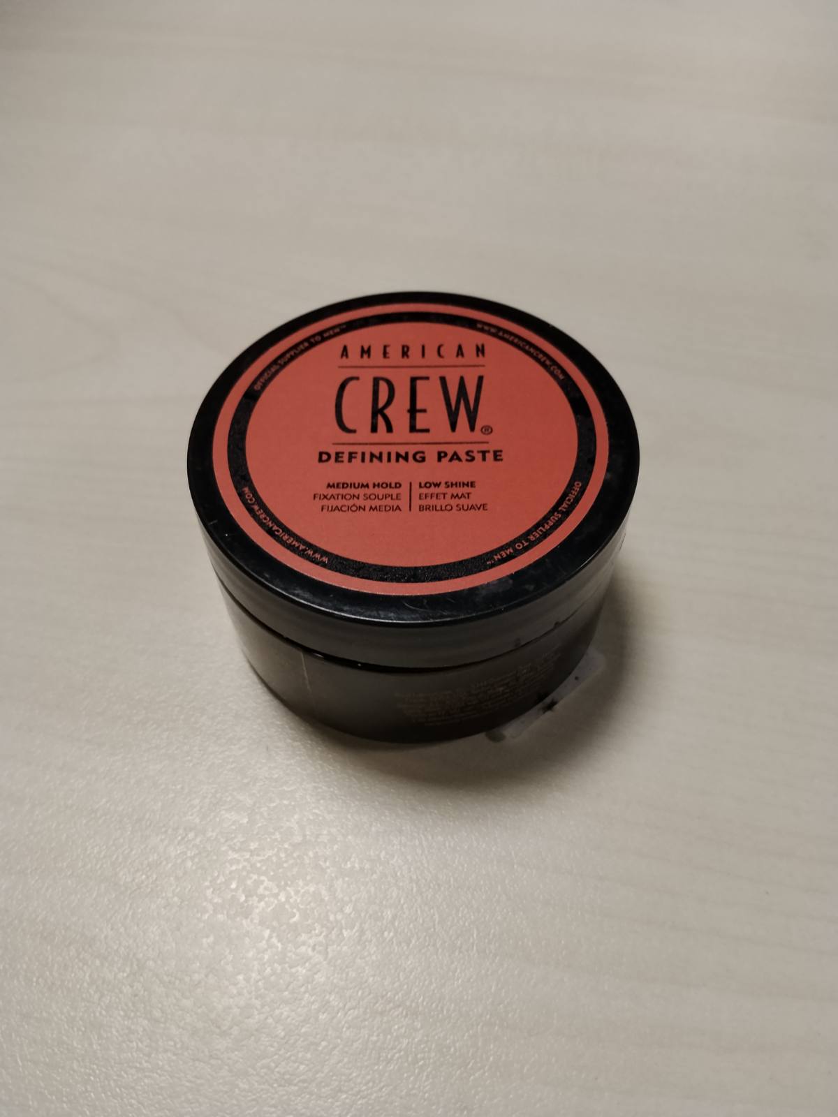303671 - AMERICAN CREW Pastë Definuese, 85 g, produkt flokësh me fiksim të mesëm, stilim fleksibël dhe me shkëlqim të lehtë.