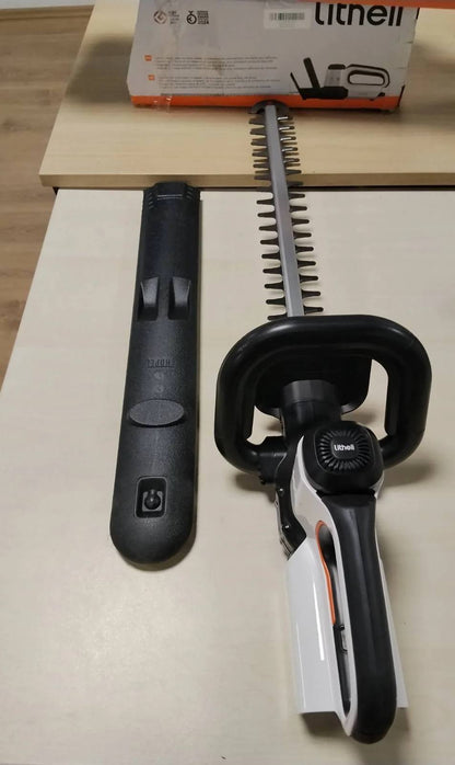 322255 - LITHELI Kositëse gardhesh pa tel, gjatësi tehu 56 cm, mbrojtëse tehu, dorezë ergonomike, bateri 2.0Ah, tehe çeliku të prera me lazer