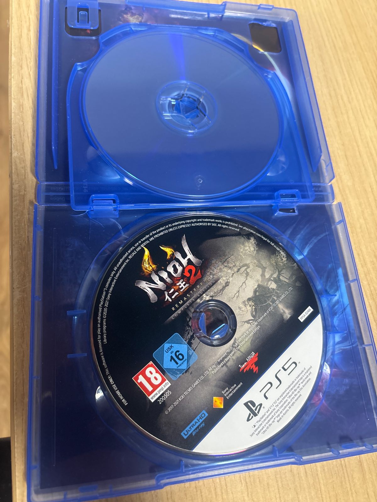 319721 - NIOH Koleksioni (PS5)