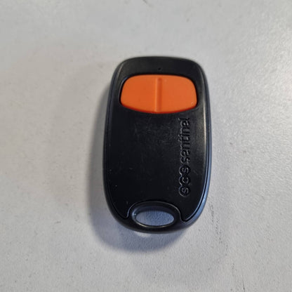 295964 - SCS Sentinel AAM0129, Telekomandë Porte 2-Kanalëshe me Kod PIN, Frekuencë 433.92 MHz, 1 Bateri Litiumi CR2032, Portokalli