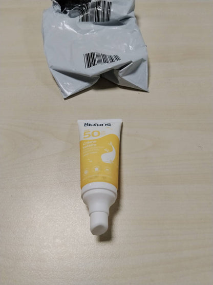 318132 - BIOLANE - Krem kundër diellit për foshnje, 50ml, SPF50, Mbrojtje e lartë kundër rrezeve UVA dhe UVB, Lëkurë e ndjeshme, Rezistent ndaj ujit, Fytyrë dhe trup, Prodhuar në Francë