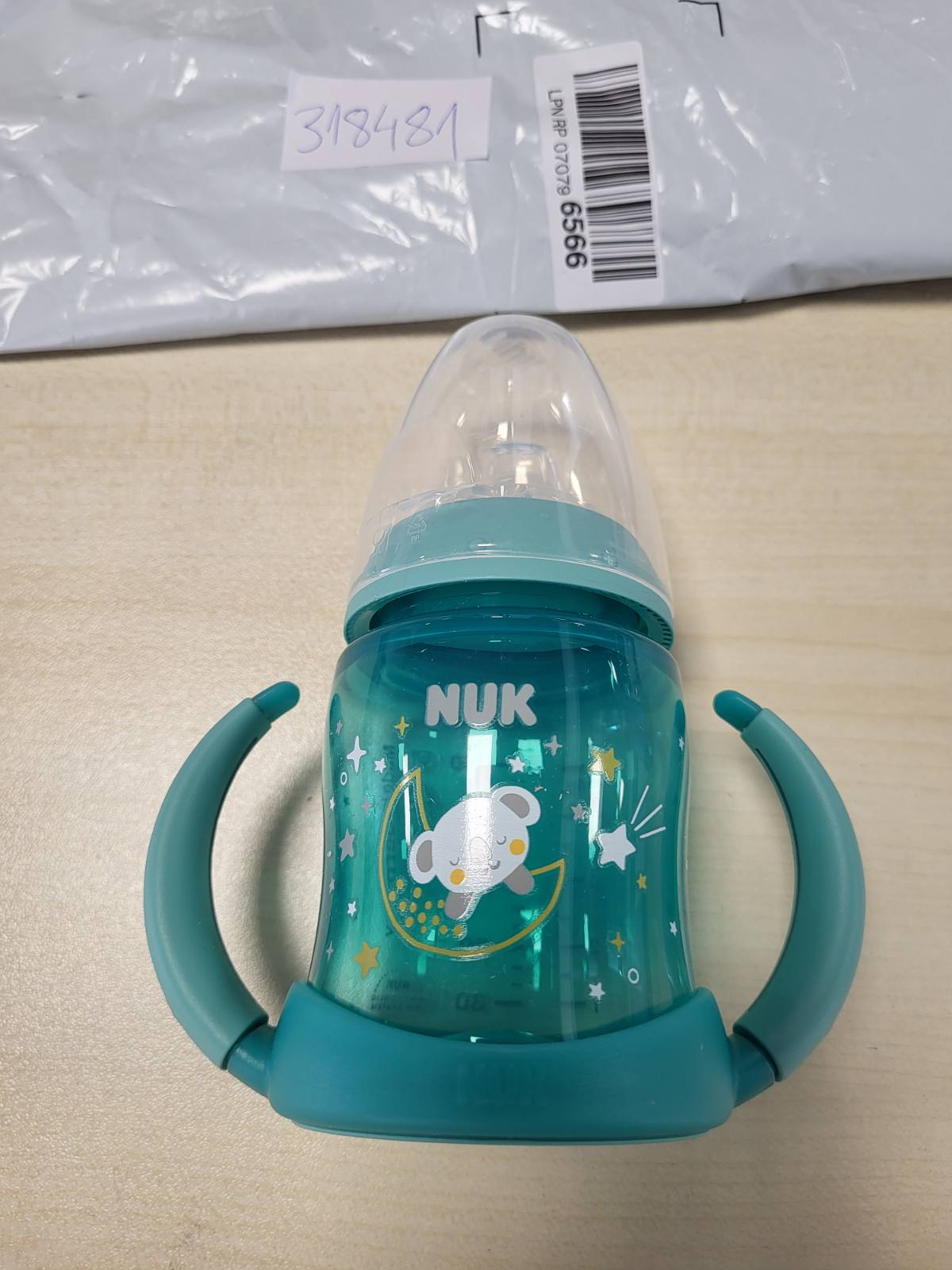 318481 - NUK First Choice Sippy Cup Night | 6-18 muaj | 150 ml | Shkëlqen në errësirë | Doreza silikoni | Grykë ortodontike | Rezistent ndaj rrjedhjeve | Pa BPA | Jeshile